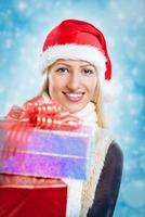Cute Girl With Christmas Gifts photo