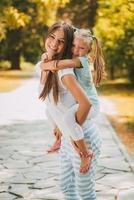 Cute Little Girl And Her Mom photo