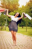 Cheerful Girl With Shopping Bags photo