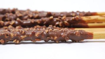 Chocolate covered breadsticks close up video