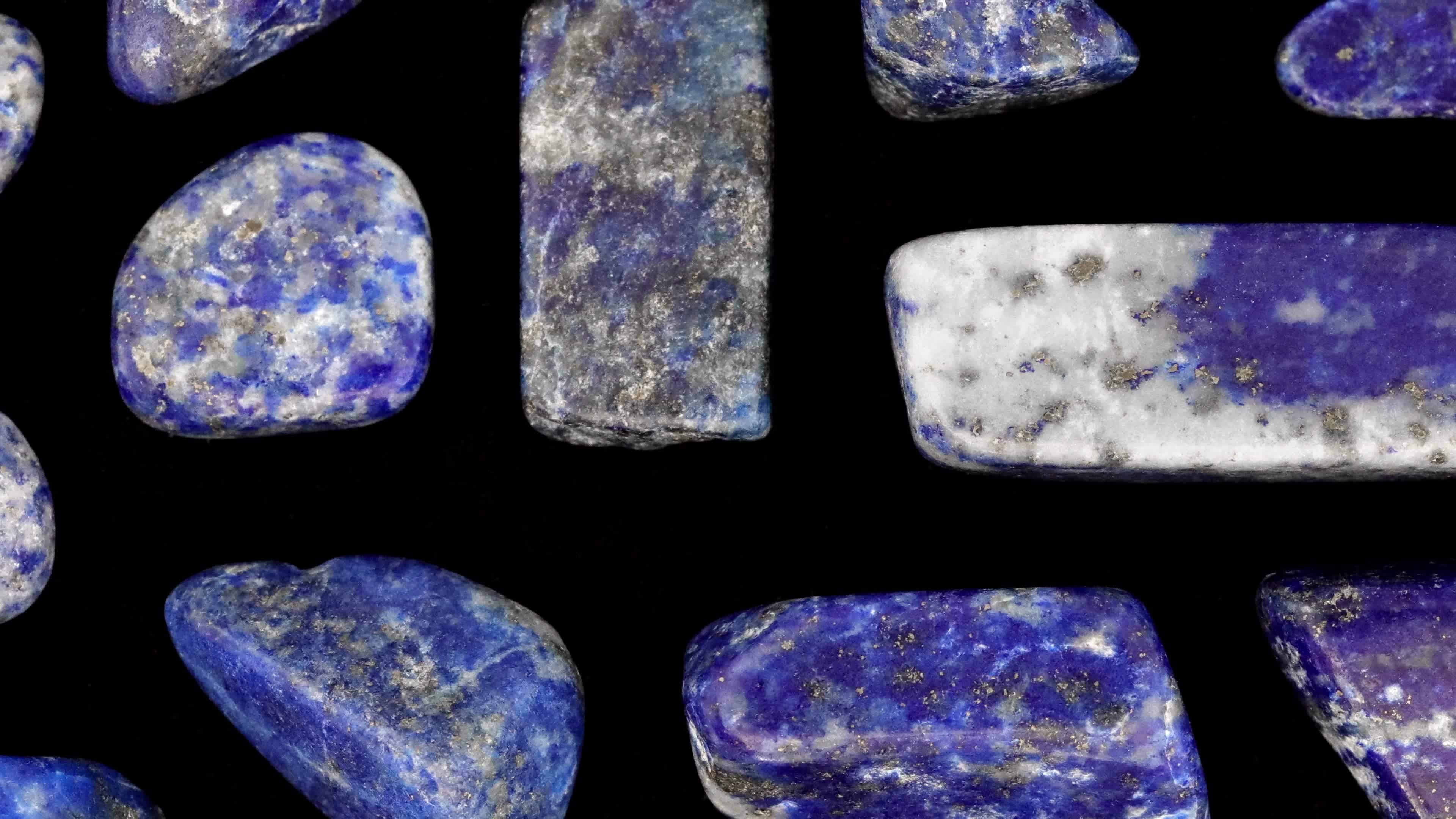 Lapis Lazuli Rare Jewel Stones Texture On Black Background Moving lapis-lazuli-rare-jewel-stones-texture-on-black-background-moving