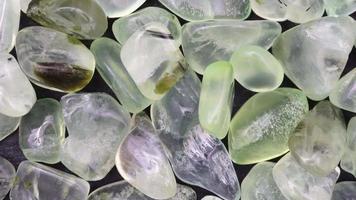 Prehnite heap jewel texture background. Moving right seamless loop backdrop. video
