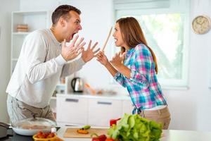 Fighting in kitchen photo