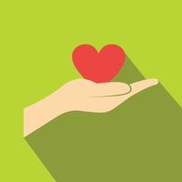 A hand giving a red heart flat icon vector