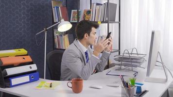 Office worker making an annoying phone call. Angry businessman wearing suit and thinking thoughtfully on the phone. video