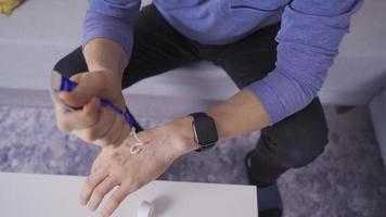 Applying cream. The man is applying cream to his hands. video