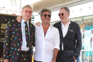 LOS ANGELES - AUG 22 - Simon Cowell, brothers at the Simon Cowell Star Ceremony on the Hollywood Walk of Fame on August 22, 2018 in Los Angeles, CA photo