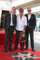 LOS ANGELES - AUG 22 - Simon Cowell, brothers at the Simon Cowell Star Ceremony on the Hollywood Walk of Fame on August 22, 2018 in Los Angeles, CA photo