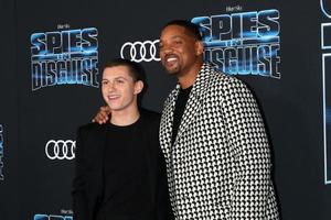 LOS ANGELES - DEC 4 - Tom Holland, Will Smith at the Spies in Disguise Premiere at El Capitan Theater on December 4, 2019 in Los Angeles, CA photo