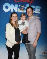 LOS ANGELES, DEC 11 - Beverly Mitchell, Kenzie Cameron, Michael Cameron at the Disney on Ice Red Carpet Reception at the Staples Center on December 11, 2014 in Los Angeles, CA photo