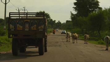 Old fashioned tractor on the roads of Rajasthan photo