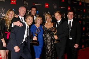 LOS ANGELES, JUN 16 - Scott Clifton, Bradley Bell, Bold and Beautiful writing team in the press area at the 40th Daytime Emmy Awards at the Skirball Cultural Center on June 16, 2013 in Los Angeles, CA photo