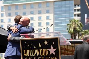 LOS ANGELES, JUN 2 - Bobby Flay, Michael Symon at the Bobby Flay Hollywood Walk of Fame Ceremony at the Hollywood Blvd on June 2, 2015 in Los Angeles, CA photo