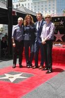 LOS ANGELES, JUN 2 - Bob Tuschman, Susie Fogelson, Brooke Johnson at the Bobby Flay Hollywood Walk of Fame Ceremony at the Hollywood Blvd on June 2, 2015 in Los Angeles, CA photo