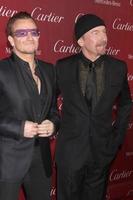 PALM SPRINGS, JAN 4 - Bono, The Edge at the Palm Springs Film Festival Gala at Palm Springs Convention Center on January 4, 2014 in Palm Springs, CA photo