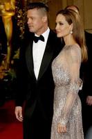 LOS ANGELES, MAR 2 - Brad Pitt, Angelina Jolie at the 86th Academy Awards at Dolby Theater, Hollywood and Highland on March 2, 2014 in Los Angeles, CA photo