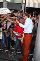 LOS ANGELES, MAY 16 - Bradley Cooper interacts with fans at the Hangover III LA premiere at the Village Theater on May 16, 2013 in Westwood, CA photo