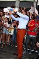 LOS ANGELES, MAY 16 - Bradley Cooper interacts with fans at the Hangover III LA premiere at the Village Theater on May 16, 2013 in Westwood, CA photo