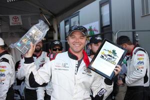 LOS ANGELES, APR 11 - Brett Davern, Pole Winner with fastest qualifying time for the Celebrities at the 2014 Pro Celeb Race Qualifying Day at Long Beach Grand Prix on April 11, 2014 in Long Beach, CA photo