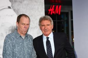 LOS ANGELES, APR 9 - Brian Helgeland, Harrison Ford arrives at the 42 Premiere at the Chinese Theater on April 9, 2013 in Los Angeles, CA photo