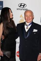 LOS ANGELES, FEB 9 - Carolyn Hollingsworth, Buzz Aldrin arrives at the Clive Davis 2013 Pre-GRAMMY Gala at the Beverly Hilton Hotel on February 9, 2013 in Beverly Hills, CA photo