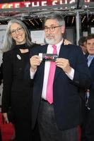 LOS ANGELES, APR 12 - John Landis, Deborah Landis arrives at the TCM 40th Anniv of Cabaret at Graumans Chinese Theater on April 12, 2012 in Los Angeles, CA photo