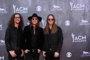 LAS VEGAS, APR 6 - Cadilac Three at the 2014 Academy of Country Music Awards, Arrivals at MGM Grand Garden Arena on April 6, 2014 in Las Vegas, NV photo