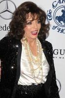 LOS ANGELES, OCT 23 - Joan Collins arrives at the 2010 Carousel of Hope Ball at Beverly HIlton Hotel on October 23, 2010 in Beverly Hills, CA photo