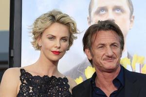 LOS ANGELES, MAY 15 - Charlize Theron, Sean Penn at the A Million Ways To Die In The West World Premiere at Village Theater on May 15, 2014 in Westwood, CA photo