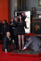 LOS ANGELES, NOV 18 - Cher at the Cher Handprint and Footprint Ceremony at Grauman s Chinese Theater Forecourt on November 18, 2010 in Los Angeles, CA photo