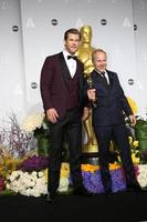 LOS ANGELES, MAR 2 - Chris Hemsworth, Glenn Freemantle at the 86th Academy Awards at Dolby Theater, Hollywood and Highland on March 2, 2014 in Los Angeles, CA photo