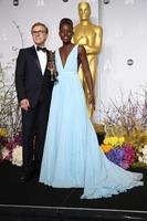 LOS ANGELES, MAR 2 - Christoph Waltz, Lupita Nyong o at the 86th Academy Awards at Dolby Theater, Hollywood and Highland on March 2, 2014 in Los Angeles, CA photo