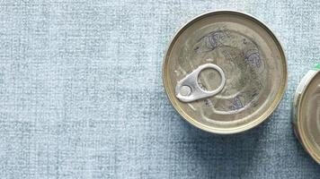 Overhead view of unopened canned goods with pull tabs video