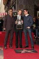 LOS ANGELES, JUN 24 - Johnny Depp, Jerry Bruckheimer, Tom Cruise at the Jerry Bruckheimer Star on the Hollywood Walk of Fame at the El Capitan Theater on June 24, 2013 in Los Angeles, CA photo