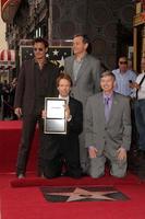 LOS ANGELES, JUN 24 - Johnny Depp, Bob Iger, Jerry Bruckheimer, Leron Gubler at the Jerry Bruckheimer Star on the Hollywood Walk of Fame at the El Capitan Theater on June 24, 2013 in Los Angeles, CA photo