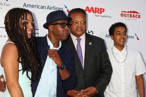 LOS ANGELES, JUL 16 - Jessie Jackson s Daughter, Arsenio Hall, Jessie Jackson, Arsenio Hall Jr at the HollyRod Presents 18th Annual DesignCare at the Sugar Ray Leonard s Estate on July 16, 2016 in Pacific Palisades, CA photo