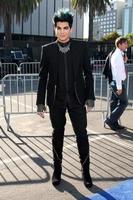 LOS ANGELES, AUG 14 - Adam Lambert arriving at the 2011 VH1 Do Something Awards at Hollywood Palladium on August 14, 2011 in Los Angeles, CA photo