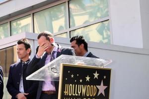 LOS ANGELES, OCT 9 - New Kids On The Block, Jordan Knight, Donnie Wahlberg, Joe McIntyre, Danny Wood, Jonathan Knight at the New Kids On the Block Hollywood Walk of Fame Star Ceremony at Hollywood Boulevard on October 9, 2014 in Los Angeles, CA photo