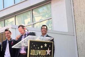 LOS ANGELES, OCT 9 - New Kids On The Block, Jordan Knight, Donnie Wahlberg, Joe McIntyre, Danny Wood, Jonathan Knight at the New Kids On the Block Hollywood Walk of Fame Star Ceremony at Hollywood Boulevard on October 9, 2014 in Los Angeles, CA photo