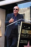 LOS ANGELES, MAY 13 - Dr Phil McGraw at the Steve Harvey Hollywood Walk of Fame Star Ceremony at the W Hollywood Hotel on May 13, 2013 in Los Angeles, CA photo