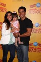 LOS ANGELES, JUL 12 - Courtney Mazza, Mario Lopez and their daughter arrives at Dragons presented by Ringling Bros and Barnum and Bailey Circus at Staples Center on July 12, 2012 in Los Angeles, CA photo