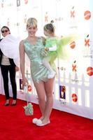 LOS ANGELES, OCT 30 - Busy Philipps and Daughter Birdie arrives at the 17th Annual Dream Halloween benefiting CAAF at Barker Hanger on October 30, 2010 in Santa Monica, CA photo