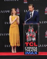 LOS ANGELES, DEC 7 - Emma Stone, Ryan Gosling at the Emma Stone and Ryan Gosling Hand and Foot Print Ceremony at TCL Chinese Theater on December 7, 2016 in Los Angeles, CA photo