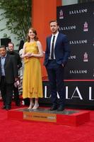 LOS ANGELES, DEC 7 - Emma Stone, Ryan Gosling at the Emma Stone and Ryan Gosling Hand and Foot Print Ceremony at TCL Chinese Theater on December 7, 2016 in Los Angeles, CA photo