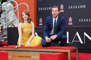 LOS ANGELES, DEC 7 - Emma Stone, Ryan Gosling at the Emma Stone and Ryan Gosling Hand and Foot Print Ceremony at TCL Chinese Theater on December 7, 2016 in Los Angeles, CA photo