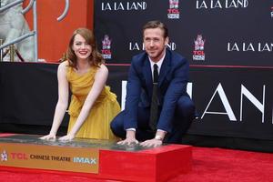 LOS ANGELES, DEC 7 - Emma Stone, Ryan Gosling at the Emma Stone and Ryan Gosling Hand and Foot Print Ceremony at TCL Chinese Theater on December 7, 2016 in Los Angeles, CA photo