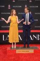 LOS ANGELES, DEC 7 - Emma Stone, Ryan Gosling at the Emma Stone and Ryan Gosling Hand and Foot Print Ceremony at TCL Chinese Theater on December 7, 2016 in Los Angeles, CA photo