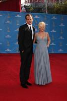 LOS ANGELES, AUG 29 - Will Arnett and Amy Poehler arrives at the 2010 Emmy Awards at Nokia Theater at LA Live on August 29, 2010 in Los Angeles, CA photo