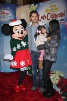 LOS ANGELES, DEC 11 - Eric Winter, Sebella Winter, Roselyn Sanchez, Minnie Mouse at the Disney on Ice Red Carpet Reception at the Staples Center on December 11, 2014 in Los Angeles, CA photo