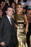 LOS ANGELES, MAR 12 - Josh Hutcherson Jennifer Lawrence arrives at the Hunger Games Premiere at the Nokia Theater at LA Live on March 12, 2012 in Los Angeles, CA photo